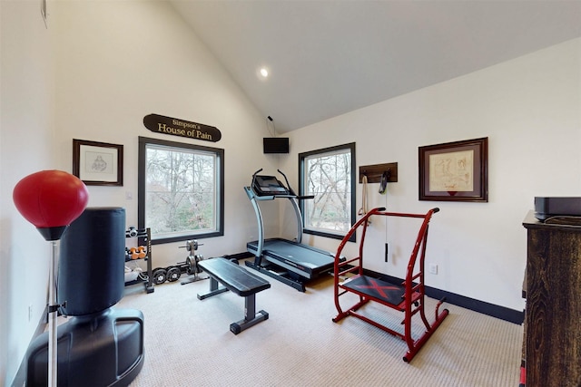 workout room with high vaulted ceiling, carpet flooring, and baseboards