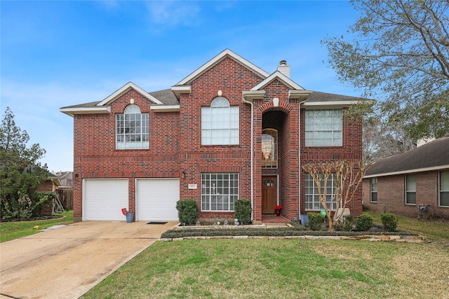 traditional home with concrete driveway, brick siding, a chimney, and a front lawn