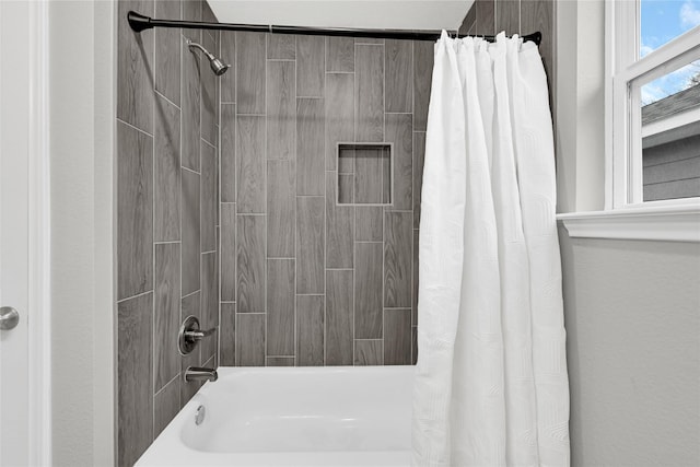 full bathroom with shower / tub combo