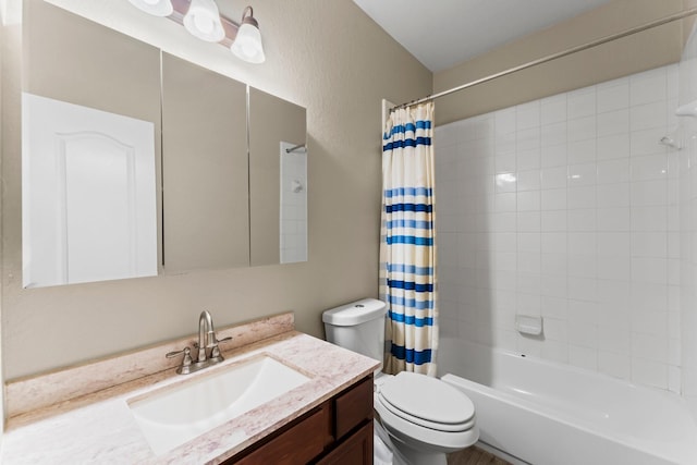 full bath with toilet, vanity, and shower / tub combo