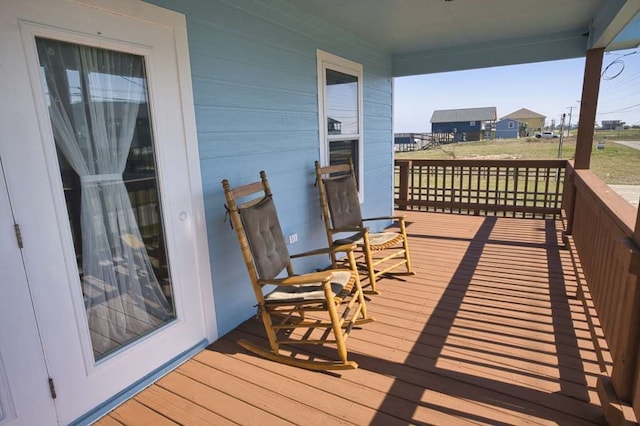 wooden deck with a porch