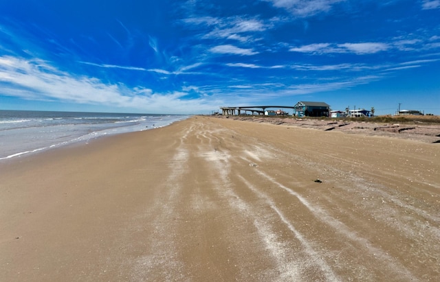 exterior space with a beach view