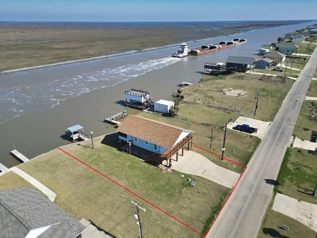 drone / aerial view featuring a water view