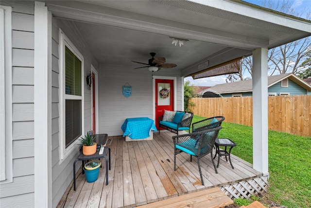 1009 Canadian St, Houston, TX 77009 - wooden terrace with a ceiling fan and fence