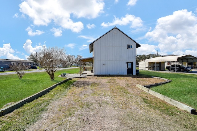 view of outdoor structure with a detached carport