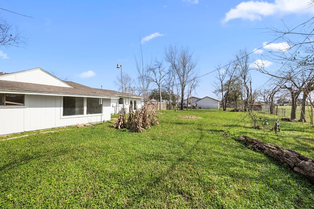 view of yard with fence