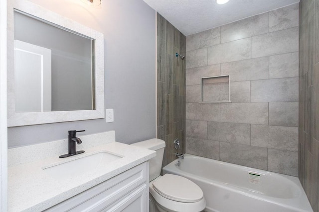 full bathroom featuring  shower combination, toilet, and vanity