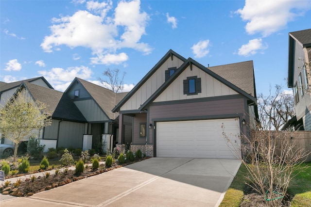 view of front of property featuring a garage, concrete driveway, brick siding, and board and batten siding