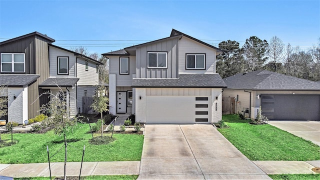 view of front of property featuring concrete driveway, a front lawn, board and batten siding, and brick siding