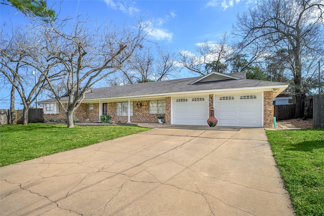 ranch-style home featuring brick siding, an attached garage, fence, driveway, and a front lawn