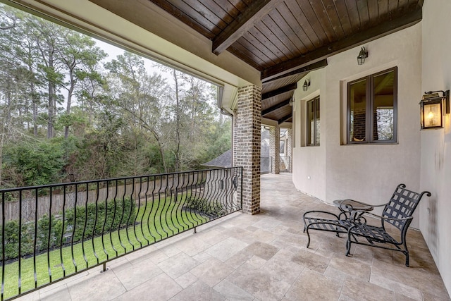 view of patio / terrace featuring fence