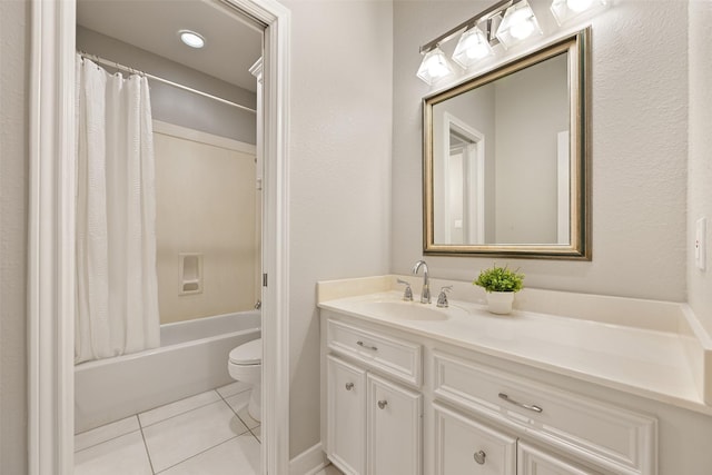 bathroom featuring vanity, tile patterned floors, shower / bath combination with curtain, and toilet