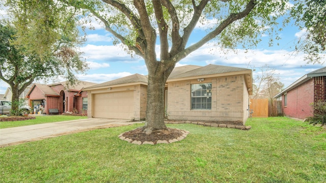 view of front of home with concrete driveway, brick siding, and a front yard