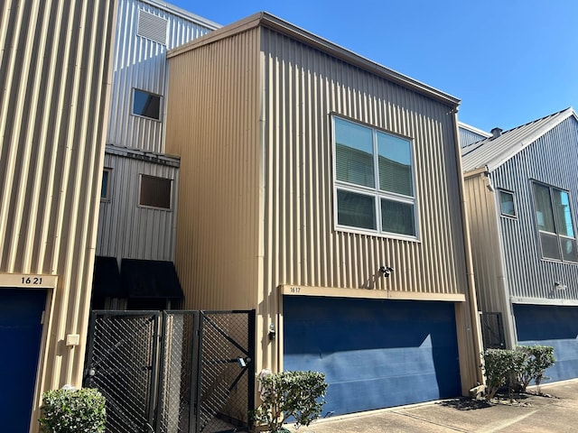 view of side of home with an attached garage