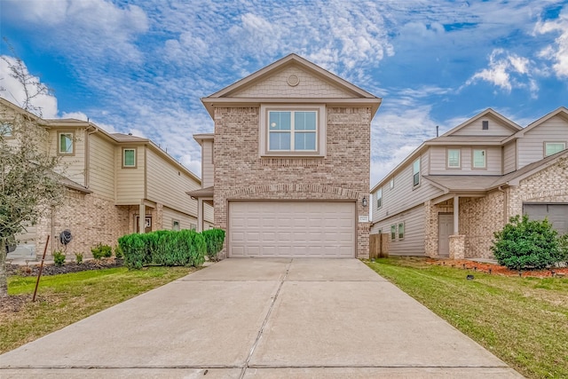 view of front facade with a garage, a front yard, concrete driveway, and brick siding