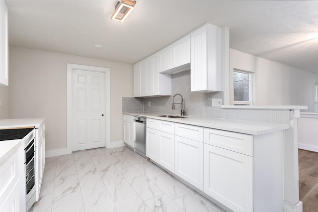 kitchen featuring white electric range oven, light countertops, white cabinets, a sink, and dishwasher