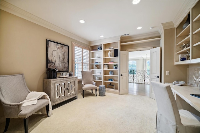 sitting room with a healthy amount of sunlight, light carpet, ornamental molding, and recessed lighting