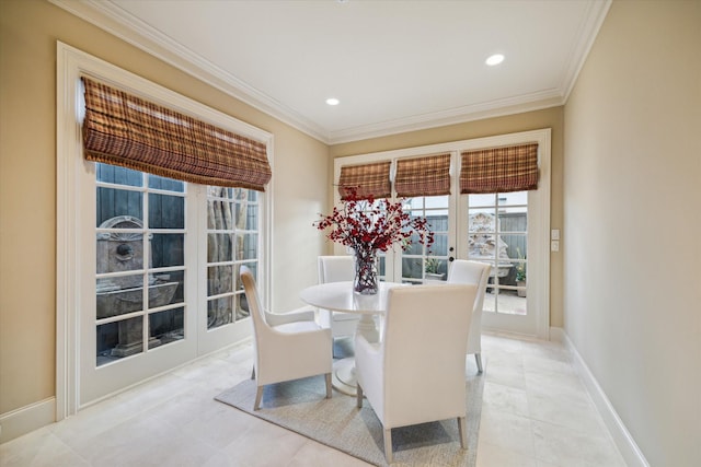 dining room featuring french doors, ornamental molding, recessed lighting, and baseboards