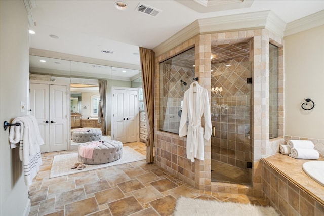 bathroom featuring crown molding, recessed lighting, visible vents, a shower stall, and tiled tub