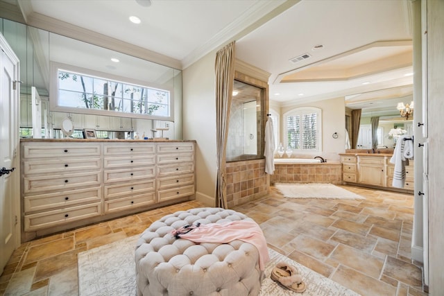 full bathroom featuring stone tile flooring, visible vents, ornamental molding, vanity, and a bath