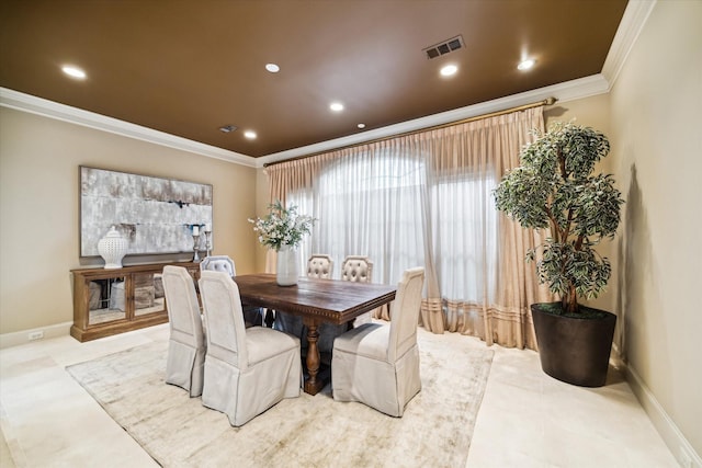 tiled dining area featuring baseboards, recessed lighting, visible vents, and crown molding