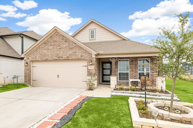 view of front facade with a garage, concrete driveway, roof with shingles, a front lawn, and brick siding