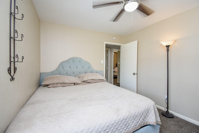 bedroom featuring carpet floors, baseboards, and a ceiling fan