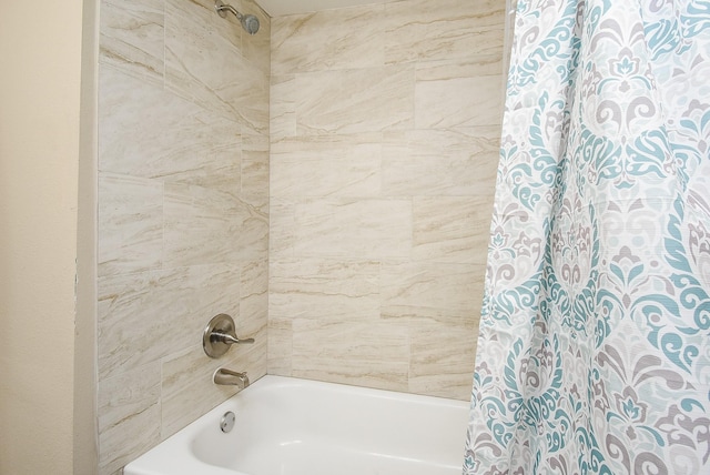 full bathroom featuring shower / bath combination with curtain