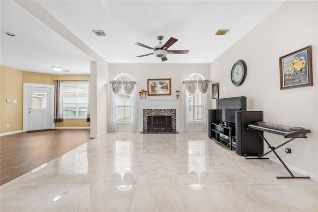 living room featuring visible vents and baseboards