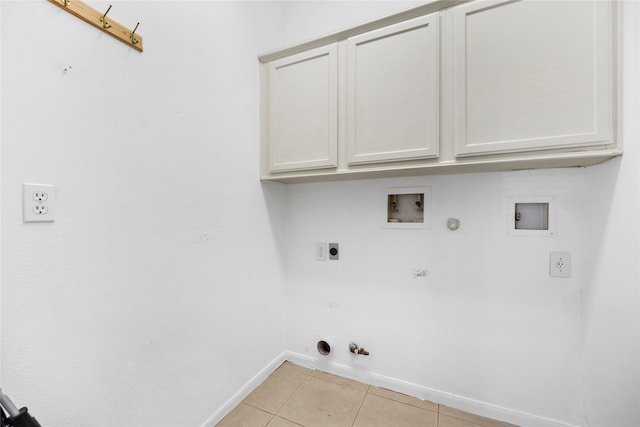 washroom featuring hookup for a washing machine, hookup for an electric dryer, gas dryer hookup, and light tile patterned flooring