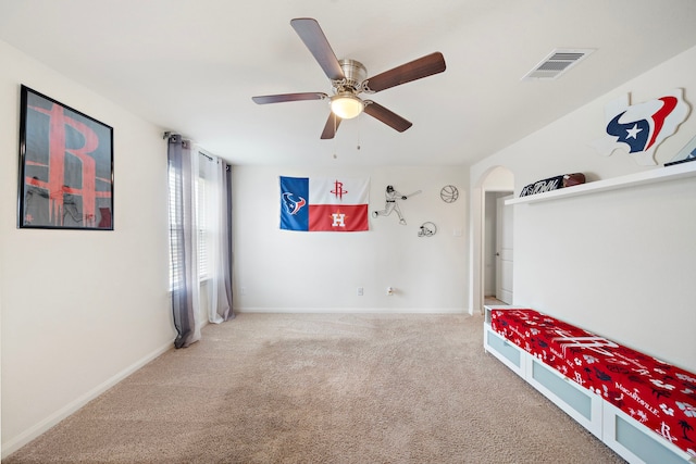 bedroom featuring ceiling fan, carpet, visible vents, and baseboards