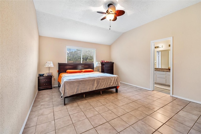 bedroom featuring lofted ceiling, a textured wall, ceiling fan, a textured ceiling, and baseboards