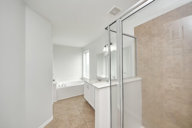 bathroom with a garden tub, tile patterned flooring, vanity, visible vents, and a shower stall