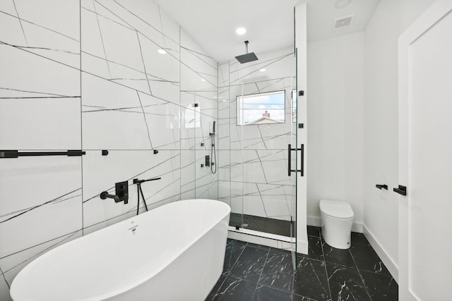 bathroom with marble finish floor, a marble finish shower, visible vents, a freestanding bath, and toilet