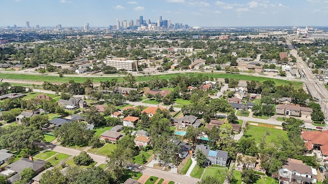 drone / aerial view featuring a city view