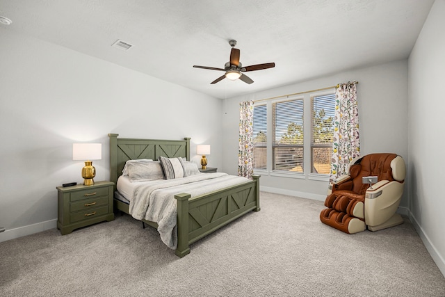 bedroom with a ceiling fan, carpet, visible vents, and baseboards