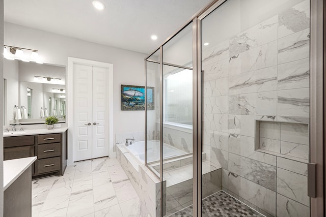 full bathroom featuring marble finish floor, recessed lighting, a stall shower, vanity, and a bath