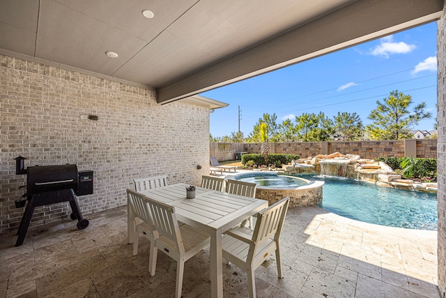 view of patio / terrace featuring outdoor dining area, a fenced backyard, a pool with connected hot tub, and a grill