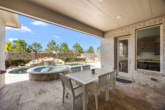 view of patio featuring an in ground hot tub, outdoor dining area, a fenced backyard, and a fenced in pool