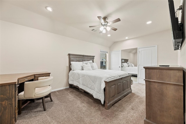 bedroom with lofted ceiling, recessed lighting, visible vents, and light colored carpet