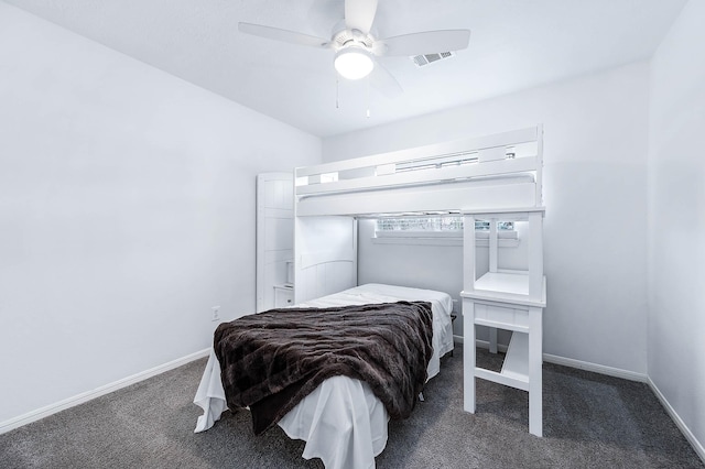 bedroom with ceiling fan, baseboards, visible vents, and dark carpet