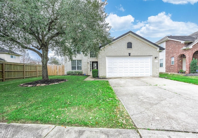 view of front of home featuring driveway, a front yard, fence, and brick siding