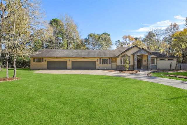 ranch-style house featuring a garage, driveway, a front lawn, and stucco siding