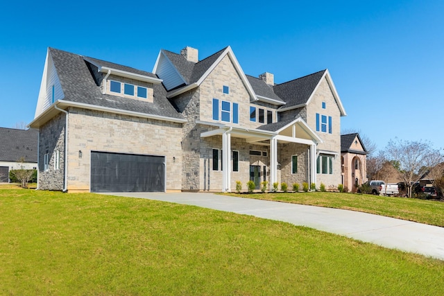 view of front of property featuring a chimney, an attached garage, a front yard, stone siding, and driveway