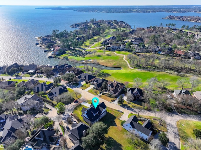 bird's eye view with a water view and a residential view