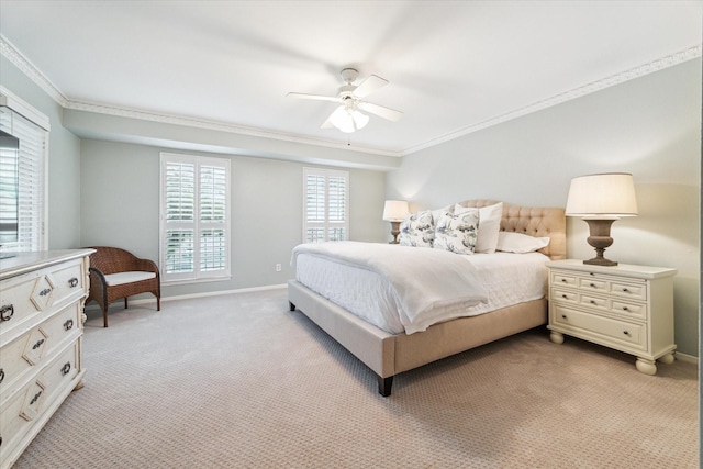 bedroom featuring light carpet, crown molding, baseboards, and ceiling fan