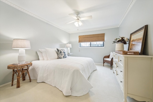 bedroom with light carpet, baseboards, ornamental molding, and a ceiling fan