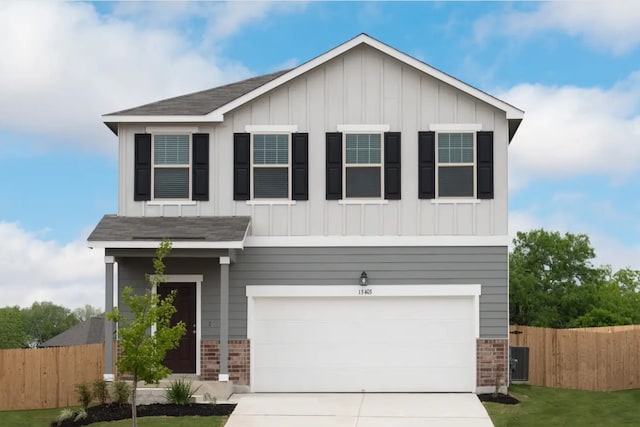 view of front facade featuring board and batten siding, brick siding, and fence