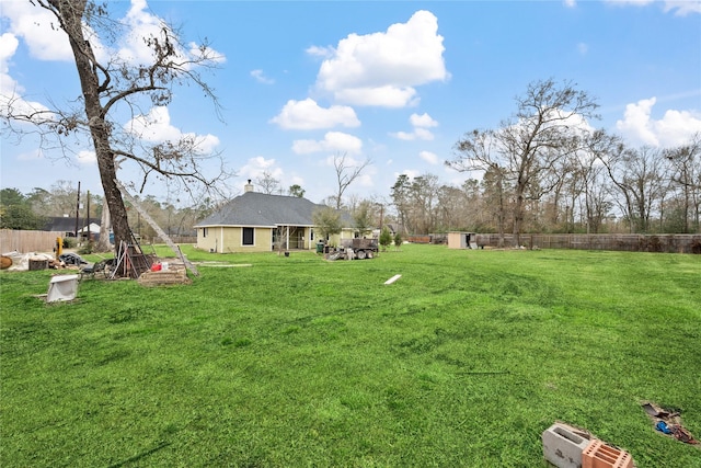 view of yard with fence