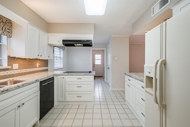 kitchen with visible vents, black appliances, and white cabinetry